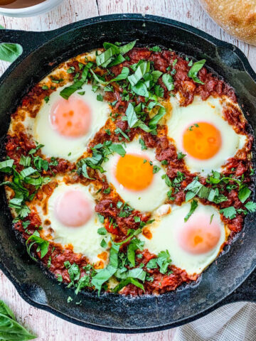 Turkish Shakshuka in a cast iron skillet.