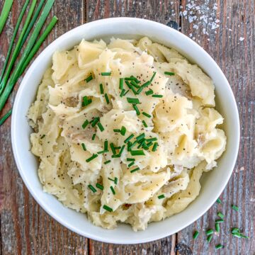 Truffle Mashed Potatoes with chives on top.