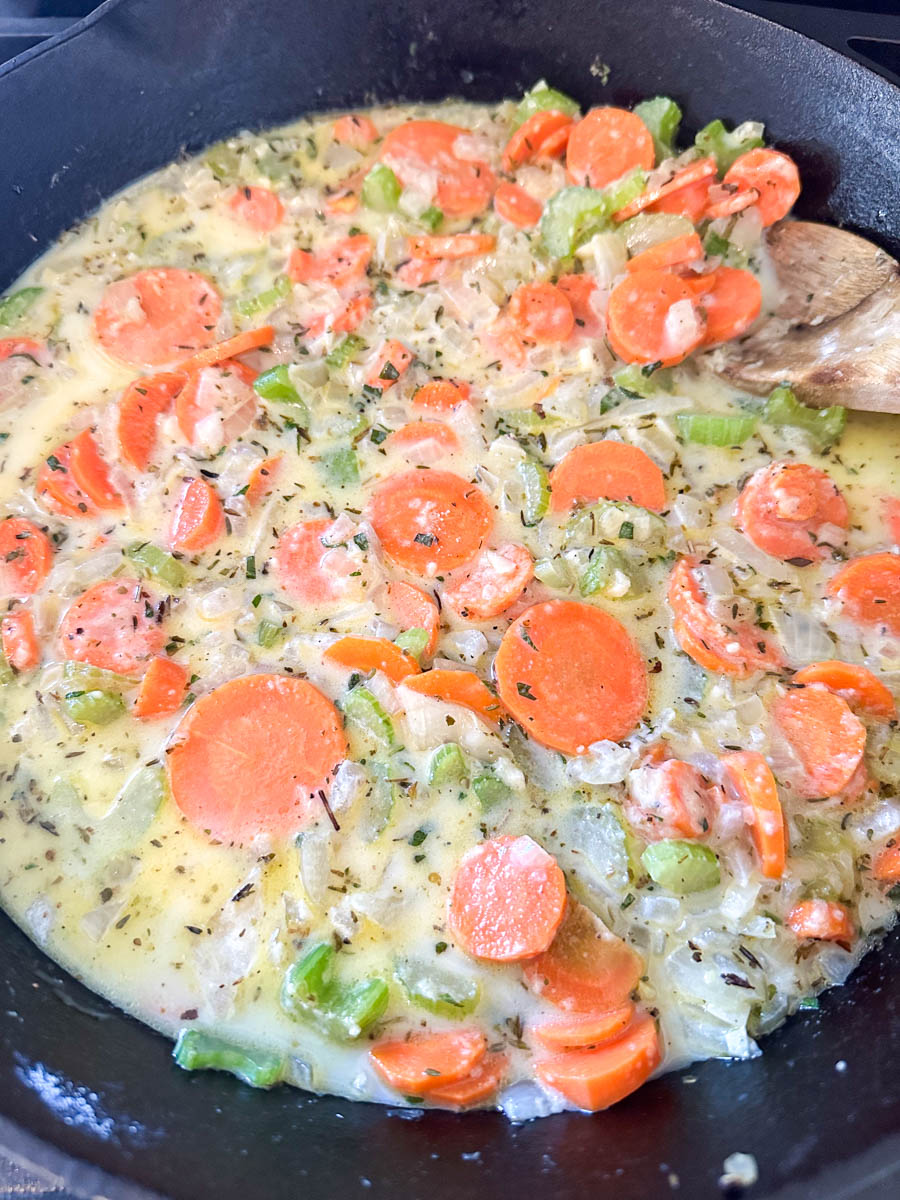 Onions, carrots and celery cooked with broth and milk.