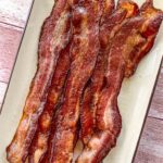 Smoked bacon on a serving dish.