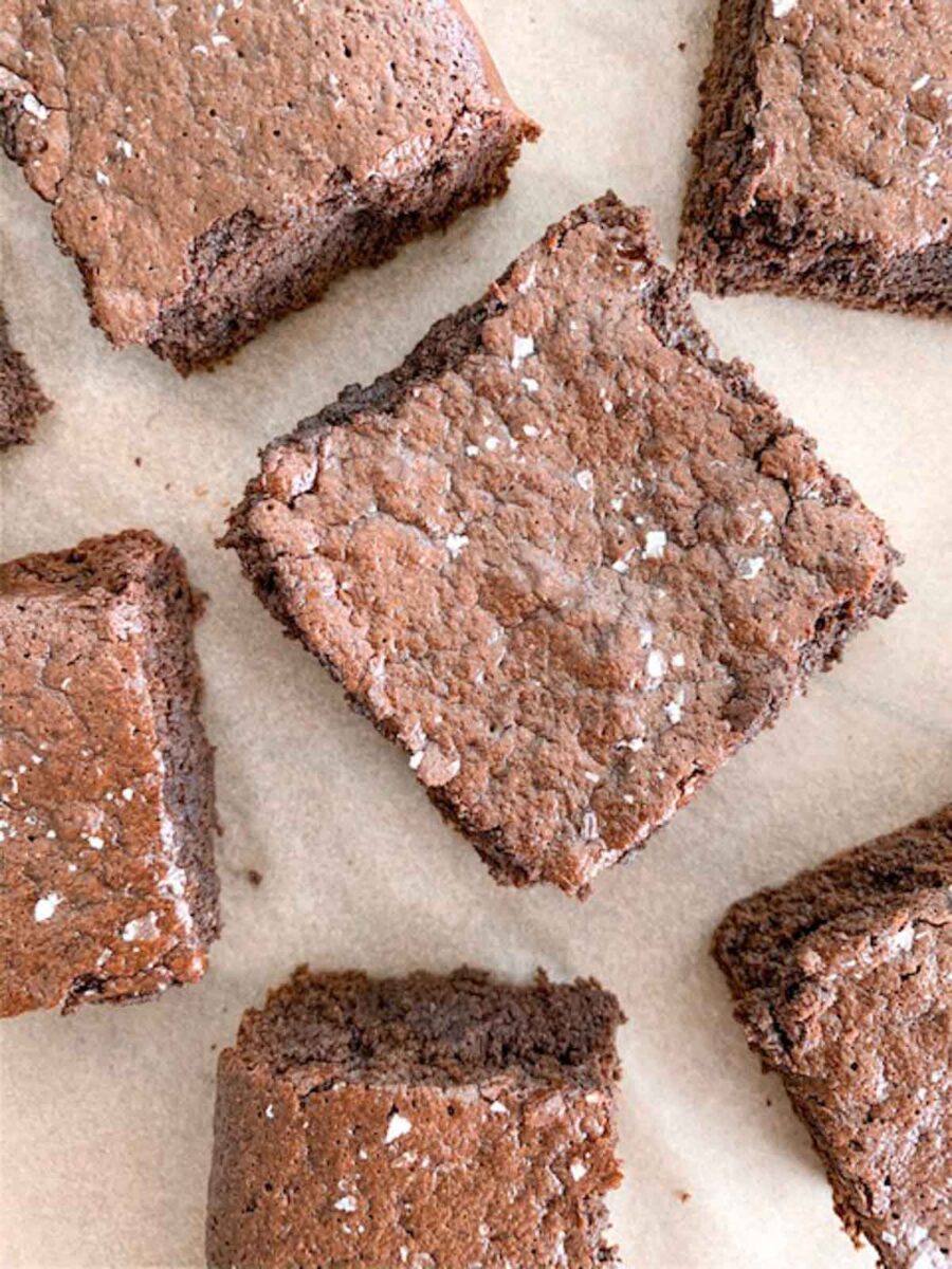 Sourdough brownies on parchment paper.