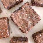 Sourdough brownies on parchment paper.