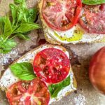 Cottage Cheese on toast with tomatoes and basil.