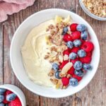 Cottage cheese topped with fresh berries and granola.