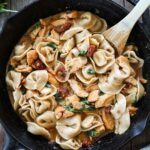 Marry me chicken tortellini in a cast iron skillet.