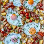 Sheet pan breakfast hash with fresh parsley and goat cheese.