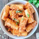 Cottage cheese vodka sauce with rigatoni pasta. Topped with basil.