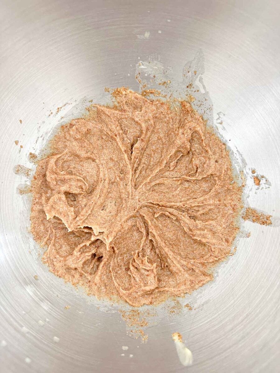 Butter and coconut sugar combined in a stand mixer.